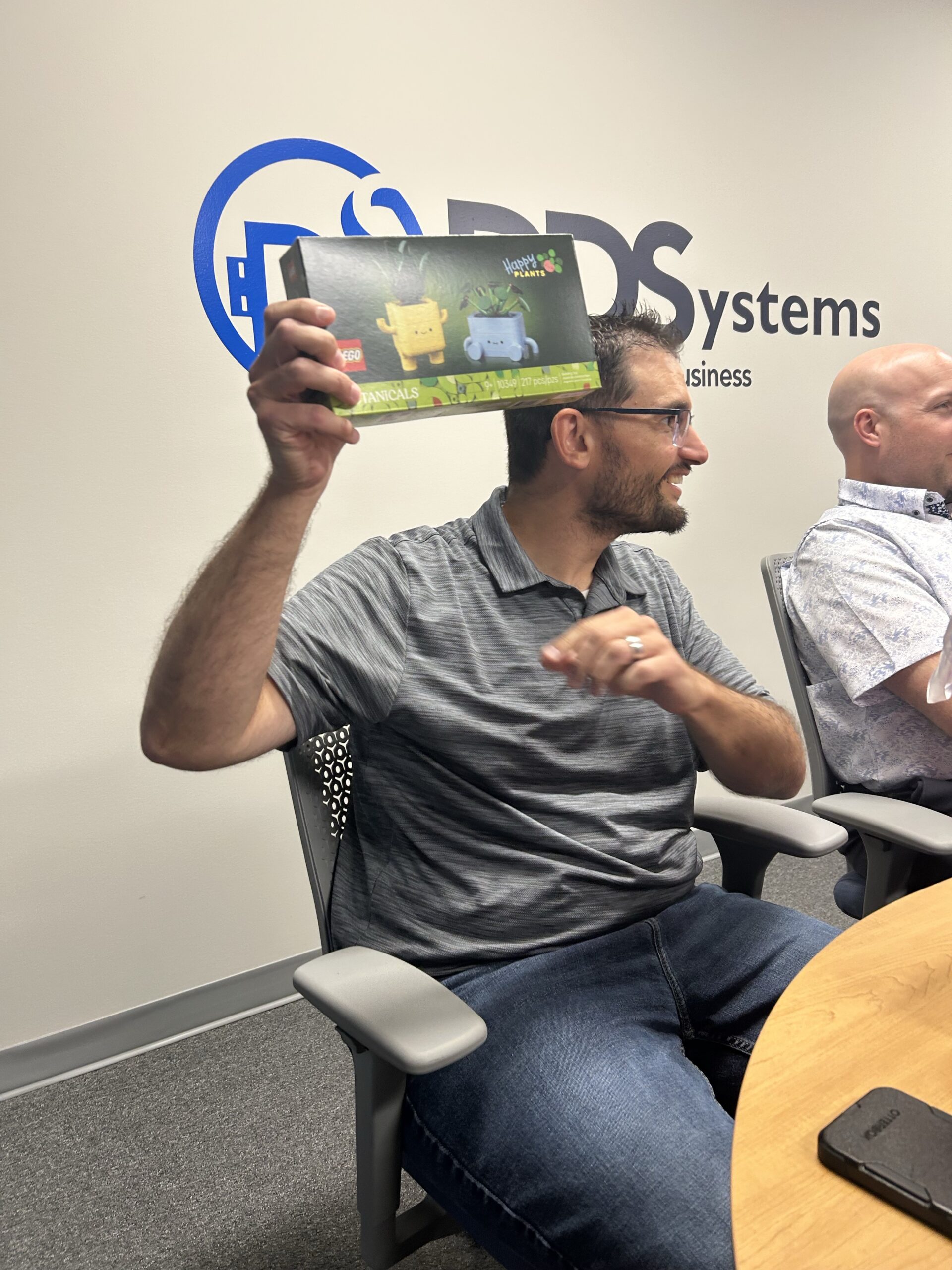 DDSystems team members taking part in the white elephant gift swap.